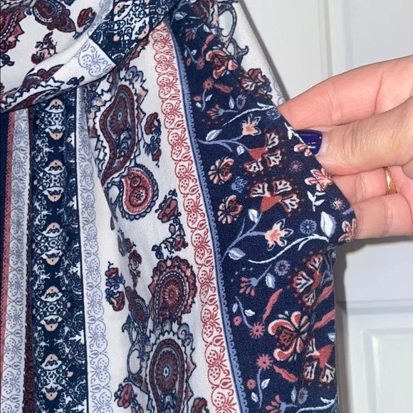 Elegant Blue and Cream Striped Jumpsuit with High Neckline - Picture 3 of 5